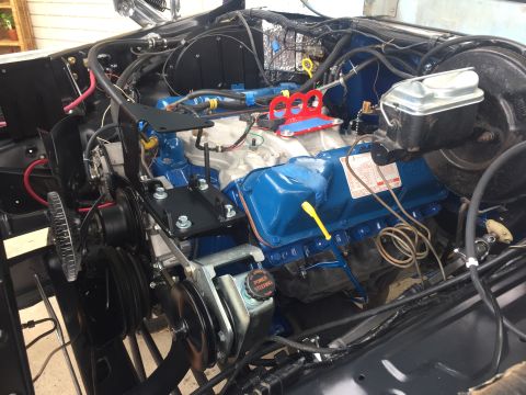 1978 Ford Bronco - Close-up view of an engine bay, showing various mechanical parts and wiring.