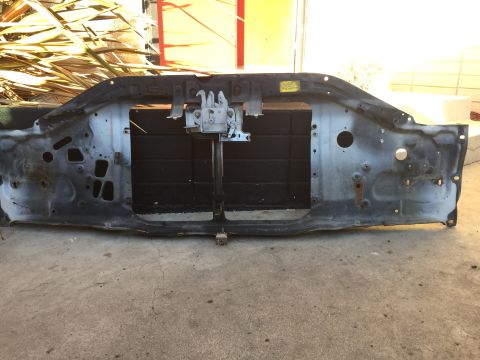 1978 Ford Bronco - This radiator support assembly, likely from an older vehicle, features the central hood latch mechanism.