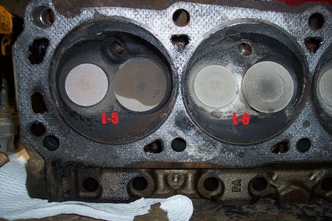 1995 Ford Bronco - Close-up view of an engine cylinder head, showing valves and labeled cylinders L-5 and L-6.