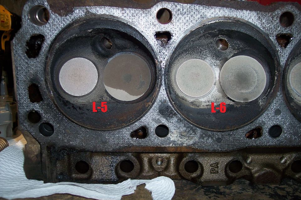 Engine cylinder head with valves and labeled cylinders L-5 and L-6