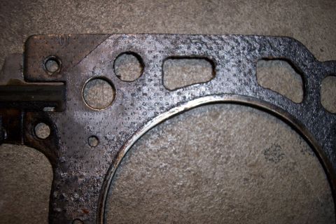 1995 Ford Bronco - Engine gasket shown in detail, likely for an older vehicle's engine rebuild.