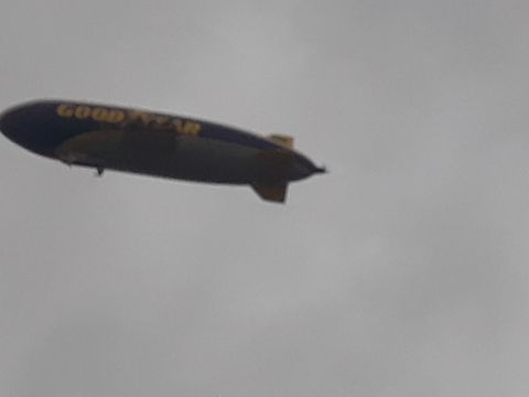 1994 Ford Bronco - A Goodyear blimp is seen in the sky, with the Supermotors.net watermark visible at the bottom right.