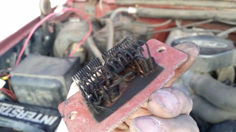 1985 Ford Bronco - This burned blower motor resistor was removed from an engine bay. The year and make are not identifiable.