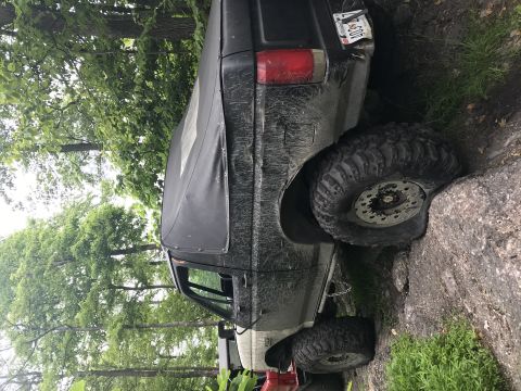 1989 Ford Bronco - This modified Ford Bronco appears to be from the late 1980s, not a 1989 model.