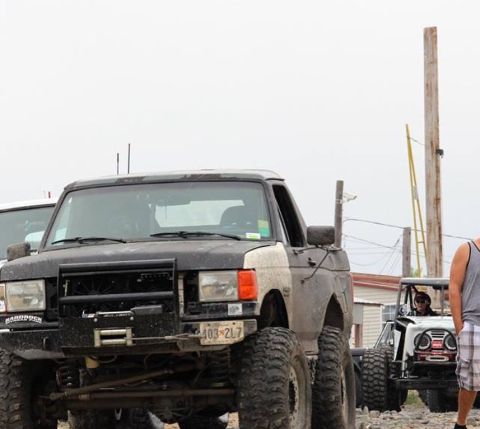 1989 Ford Bronco - This lifted 1989 Ford Bronco is equipped with a winch and oversized tires, ready for off-road adventure.