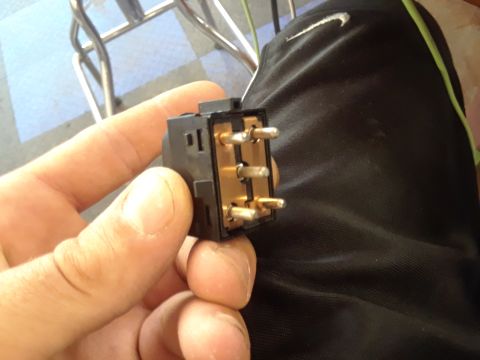 1999 Ford E250 - Close-up of an electrical switch with multiple pins.