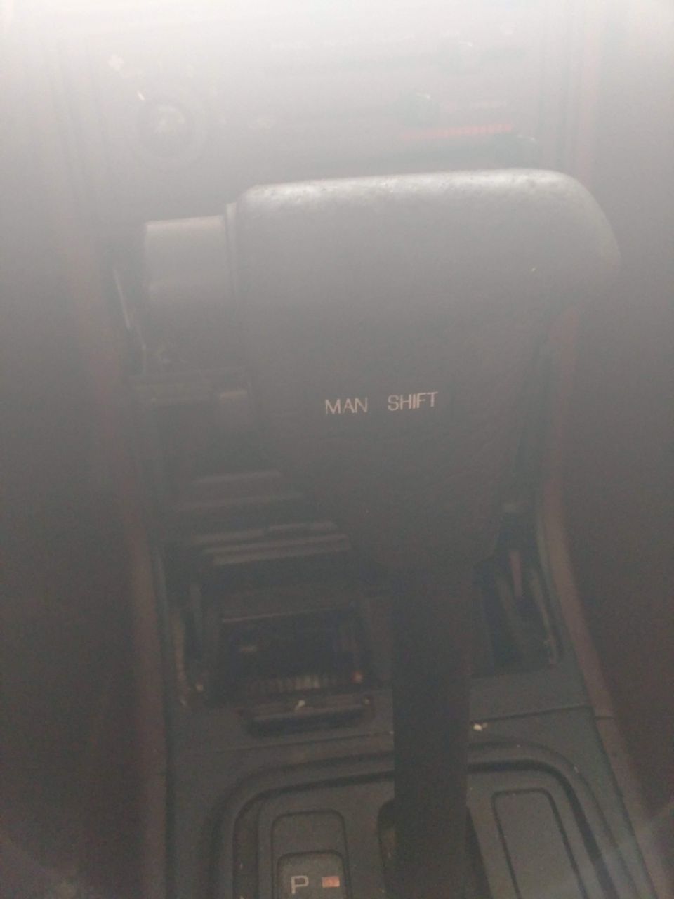 Automatic gear shifter with "MAN SHIFT" text