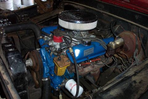 1968 Ford F-100 - Close-up of a Ford V8 engine, likely from the late 1960s, showing its components.