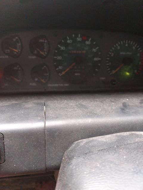 1989 Ford Probe - Close-up of a car's interior dashboard, showing electronic components.