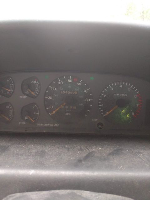 1989 Ford Probe - The vehicle's dashboard displays the speedometer, tachometer, fuel level, and temperature gauges, with the odometer reading 178,397.