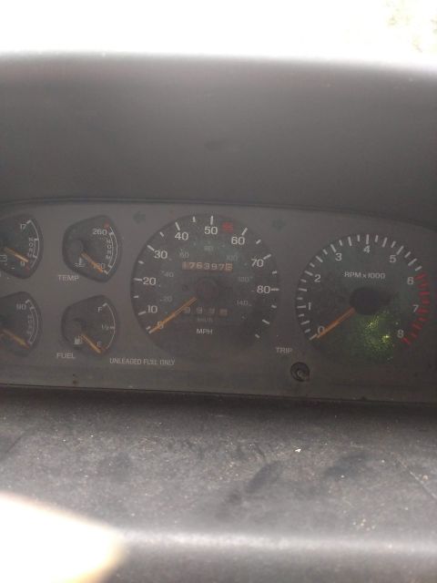 1989 Ford Probe - Interior view of a vehicle's dashboard, showing various gauges and the odometer.