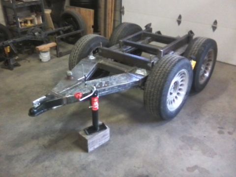 1984 Honda ATC 250 R - A custom trailer chassis is shown in a garage setting, ready for further modification.