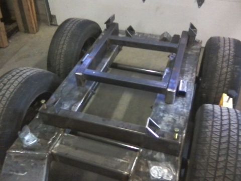 1984 Honda ATC 250 R - A custom-built trailer frame is shown with four tires mounted, ready for further construction.