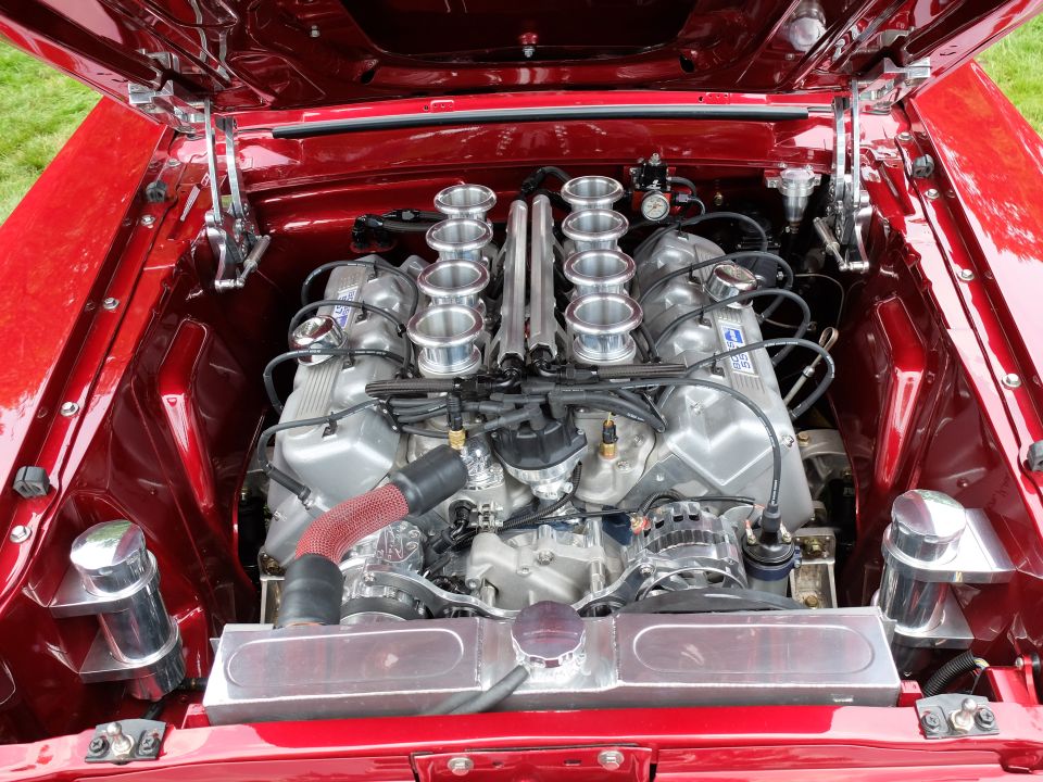 V8 engine with eight individual carburetors and polished intake runners