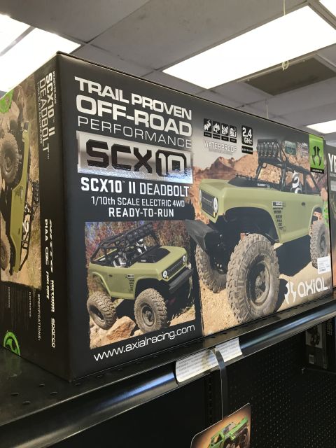 1989 Ford Bronco - Box art for an Axial SCX10 II Deadbolt RC car, depicting the off-road vehicle.