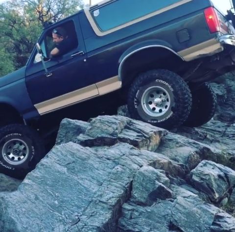 1991 Ford Bronco - This 1991 Ford Bronco is navigating a challenging rocky terrain.