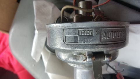 1973 Ford Mustang - Close-up of an Autolite distributor, part number 12127, with a date code of 9012 visible.