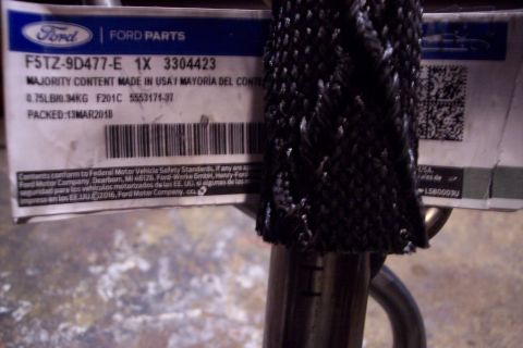1995 Ford Bronco - This is a close-up of a Ford parts label, showing the part number and manufacturing details.