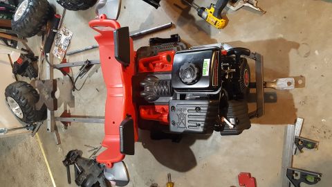 2007 Subaru Impreza - A red plastic body with a small engine and large tires is shown, possibly a go-kart or similar recreational vehicle.