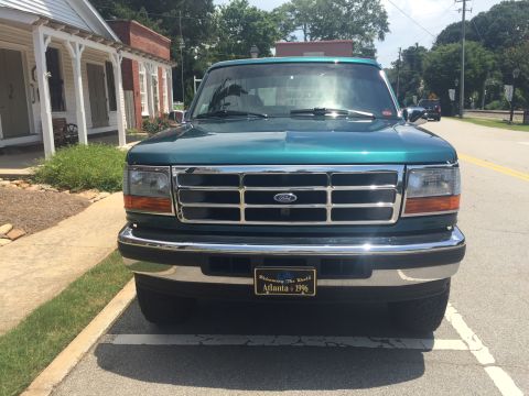 1996 Ford Bronco - This 1996 Ford Bronco is seen from the front, a license plate that reads 'Atlanta 1996'.