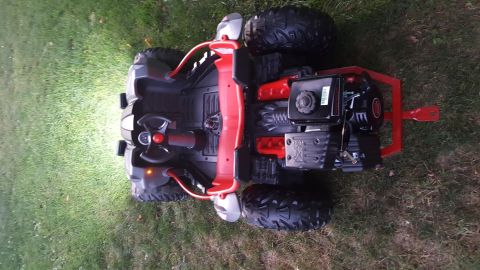 2007 Subaru Impreza - This go-kart has a visible engine and sits on a grassy area.
