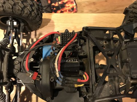 1989 Ford Bronco - Close-up view of the internal components and chassis of a remote control car.