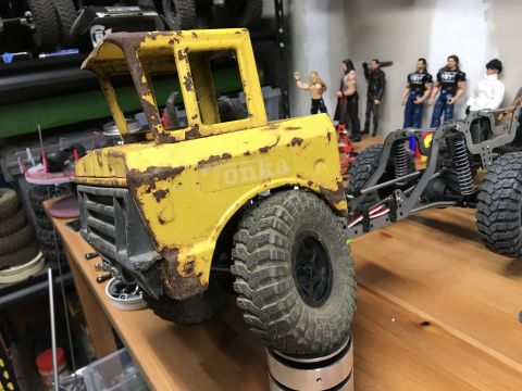 1989 Ford Bronco - A weathered yellow Tonka toy truck body is shown on a custom RC chassis.