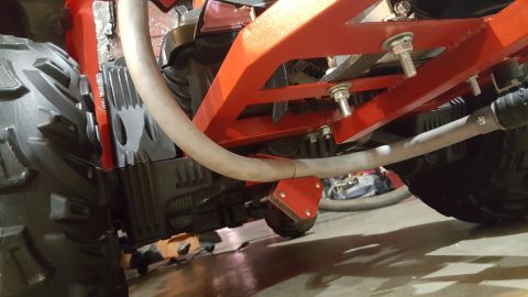 2007 Subaru Impreza - Undercarriage view of an off-road vehicle, showing its frame and tire tread.