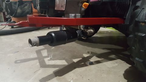 2007 Subaru Impreza - Close-up view of an exhaust pipe and engine part, not a 2007 Subaru Impreza.