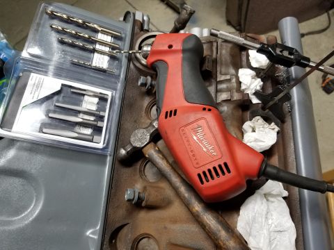 1996 Ford Bronco - After a few days soaking with penetrant, I punched, drilled, & extracted the 2 ex.man. bolts that had sheared. These [url=https://www.amazo…