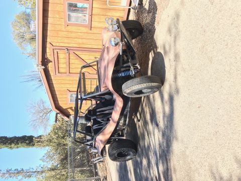 1968 Ford Mustang - Photograph of a dune buggy parked outdoors, not a technical document.