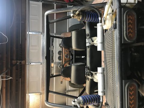 1968 Ford Mustang - Photograph of the rear interior of a dune buggy, not a technical document.