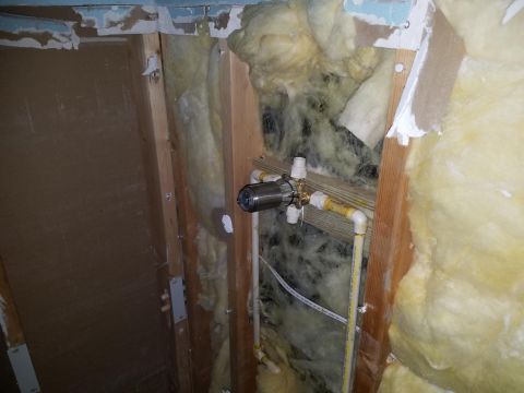 1994 Ford Bronco - Photograph of in-wall plumbing during renovation, not a technical document.