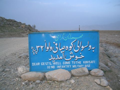 1981 Ford Bronco - A sign welcomes visitors to the 32nd Infantry Military Base in Afghanistan, with text in both Pashto and English.