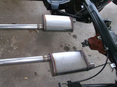 1967 Ford Galaxie - Two MagnaFlow mufflers are shown installed on a vehicle's exhaust system.