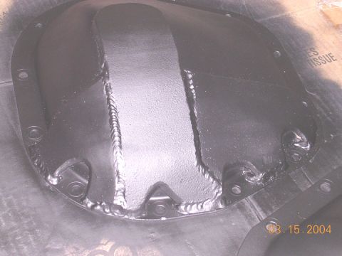 1994 Ford Bronco - rearcover on the ground. I hoping the overlap onto the lip will help prevent the bolts from getting ground down by rocks and that the lip w…