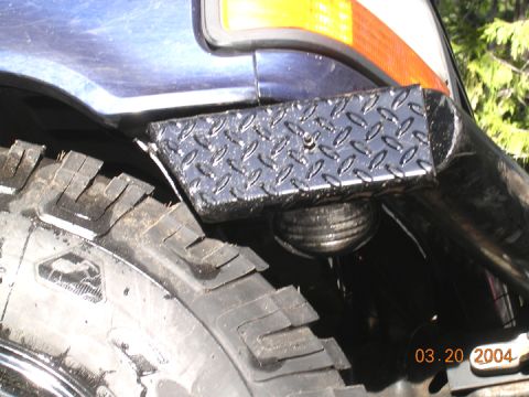 1994 Ford Bronco - still need to trim the front some. The bumper clears fine after trimming 2" out, but the inner fender rubs.