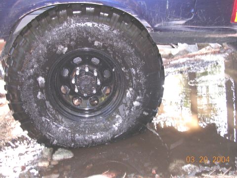 1994 Ford Bronco - as the rear stuffs and the axle moves back, i am getting some decent rubbing, but with a just a little more trimming, it should tuck ok.