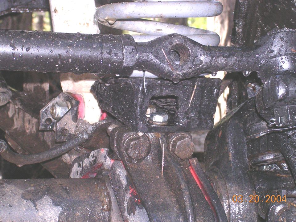 some guy with a cruiser had this take on the lower coil spring mounts using a ford set up.  I like how he shimmed it to alleviate the need for a drop down bracket on the radius arms.  keeps the lower coil from bowing as much