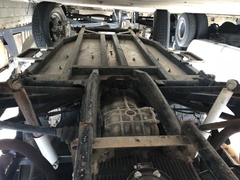 1970 Volkswagen Beetle - Focus on the chassis and drivetrain components, not a complete vehicle.
