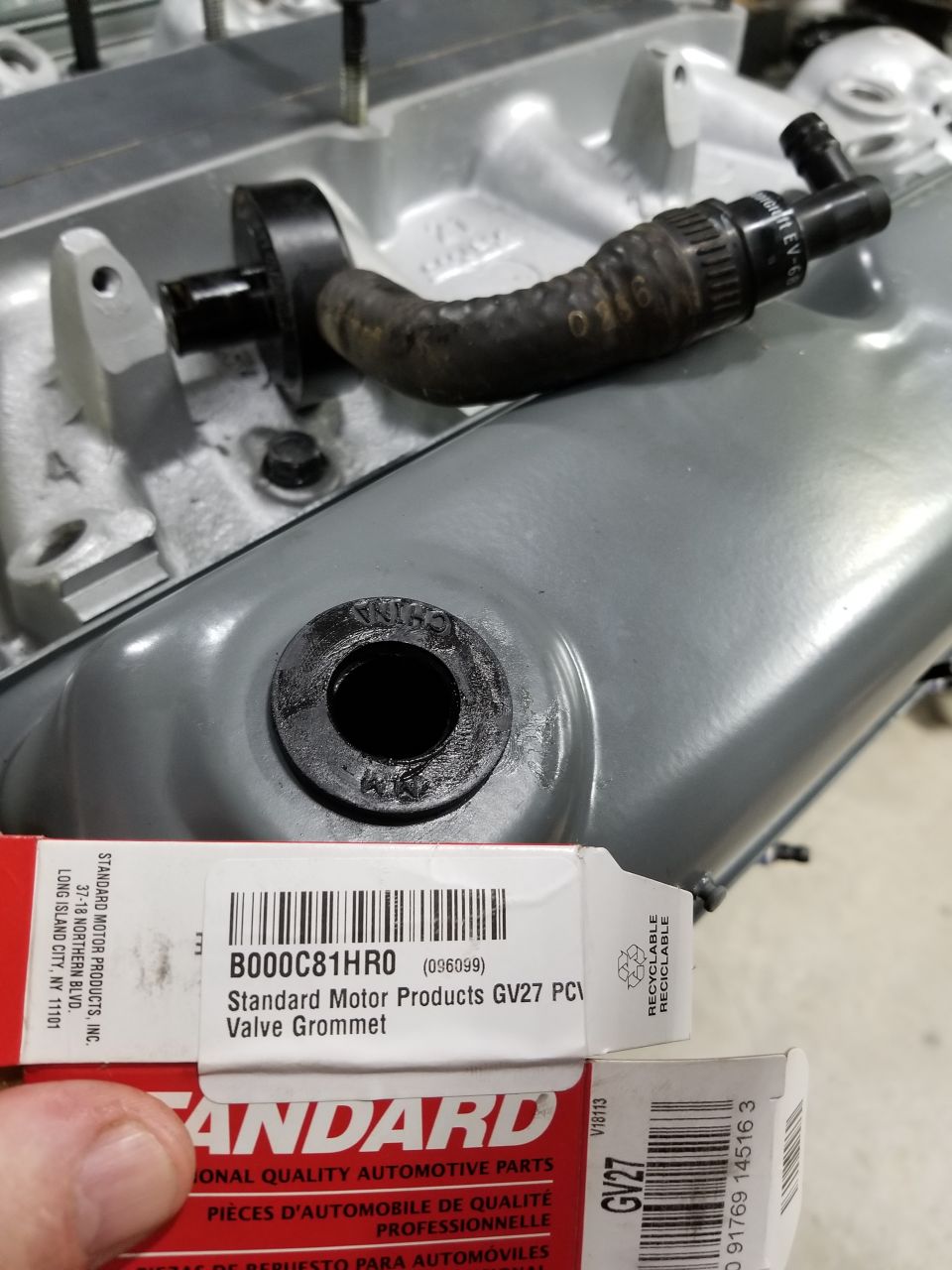 I didn't realize this grommet would be chinese when I ordered it, but my local Ford doesn't sell it (possibly E7AZ-6A892-A).
0.715 In. ID x 1.440 In. OD x 0.493 In. Thk.

The PCV valve is [url=https://www.amazon.com/dp/B000C5FJG8]MotorCraft EV-68[/url], and it's in the revised configuration (above the valve cover).