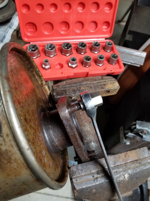 1996 Ford Bronco - These have been soaking for a couple of months, but they were still tight. 2 came out this way... See the NEXT pic.