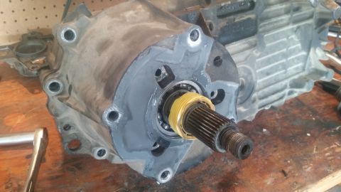 1985 Ford Bronco - Close-up of a transmission part, likely undergoing repair or rebuild.