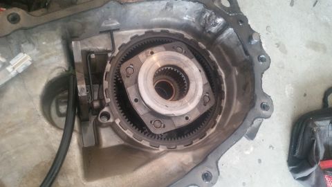 1985 Ford Bronco - Internal view of an automatic transmission, focusing on the torque converter and gear set.