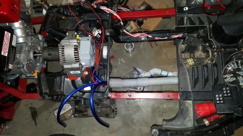 2007 Subaru Impreza - Close-up of a generator and alternator assembly, showing wiring and plumbing.