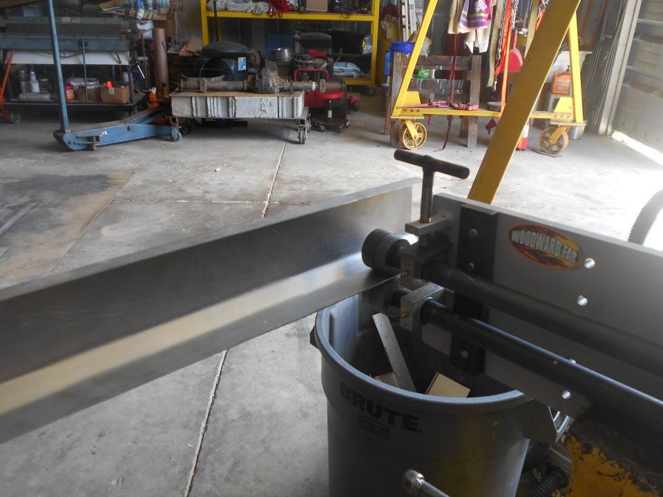 Sheet metal roller with 'WOODWARD FAB' logo