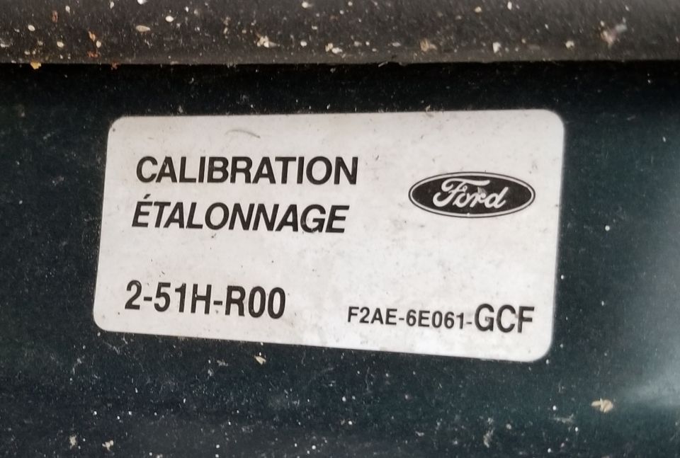 Ford calibration sticker with part number F2AE-6E061-GCF