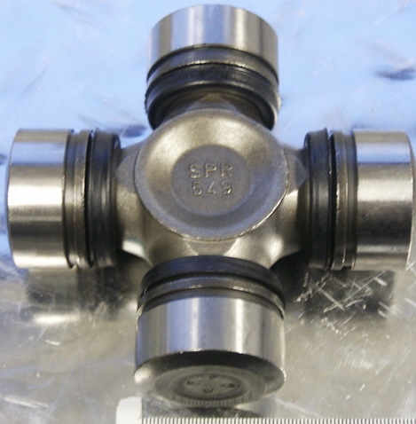1995 Ford Bronco - A universal joint part is shown in a close-up view, with visible markings.