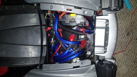 2007 Subaru Impreza - Wiring for a car audio amplifier, showing power and signal cables connected to a fuse holder.