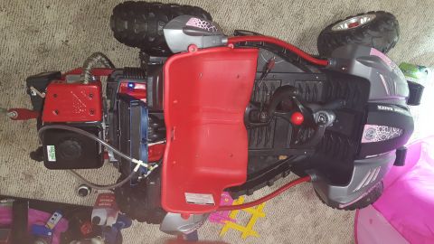 2007 Subaru Impreza - This toy dune buggy has a red seat and steering wheel, with 'DUNE RACER' text visible.